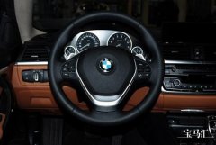 宝马方向盘越开越重的原因解析
